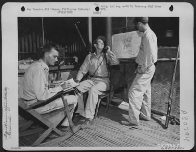 Consolidated > During the intense fighting for the recapture of Clark Field on Luzon, Philippine Islands, the nerve center of the air liaison plane radio net was located in an abandoned shack, at the edge of the hastily constructed cub strip. Lt. Donald Moore of