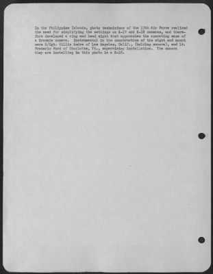 Thumbnail for Consolidated > In the Philippine Islands, photo technicians of the 13th Air Force realized the need for simplifying the settings on K-17 and K-18 cameras, and therefore developed a ring and bead sight that approaches the operating ease of a Brownie camera.