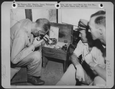 Thumbnail for Consolidated > While he was held in Bilibid Prison, Manila, Philippine Islands with other veterans of Corregidor and Bataan, Lt. Homer Hutchinson, Pasadena, Calif., built a radio set with parts he secretly took from the Japanese. The set was concealed in the seat