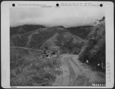 Thumbnail for Consolidated > Natives work on the road at Belete Pass, Philippine Islands. 12 June 1945.