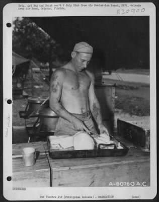 Thumbnail for Consolidated > Preparing food in an open field kitchen. Manila, Philippine Islands.