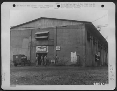 Thumbnail for Consolidated > Enlisted personnel who are arriving at the registration building of the Manila Leave Center, Luzon, Philippine Islands, will be registered, assigned bullets and informed of the recreational facilities available at the center. 28 August 1945.