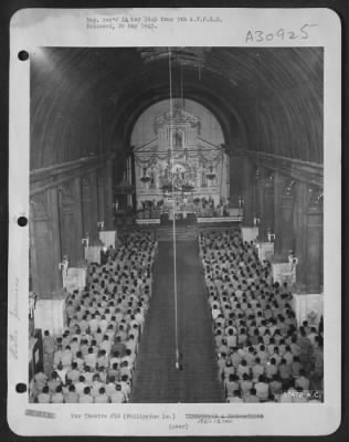 Thumbnail for Consolidated > Fifth Air Force men attending Easter Services in a bomb-damaged Catholic Church at Angeles, Luzon, Philippine Islands.