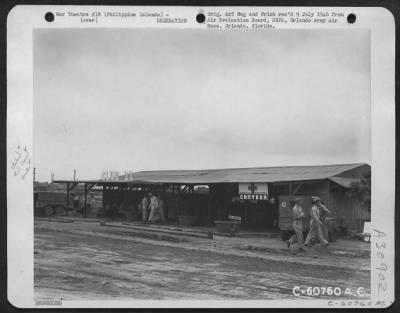 Thumbnail for Consolidated > American Red Cross Canteen, "Club 22" at the 22nd. Replacement Depot, Philippine Islands. Only a lending library was open at the time this photo was made but he Milk bar, Game room, and other facilities were opened shortly afterwards.