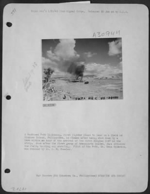 Thumbnail for Consolidated > A Lockheed P-38 Lightning, first fighter plane to land on a field on Mindora Island, Philippines, in flames after being shot down by a Zero within an hour of the arrival of the first Douglas C-47 at the strip. Soon after the first group of transports