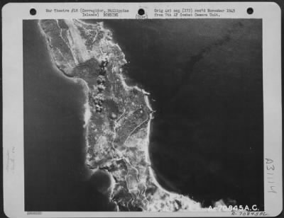 Consolidated > Bombs, dropped by Consolidated B-24 "Liberators" of the 494th Bomb Group, burst on the target at Corregidor in the Philippine Island on 14 March 1945.