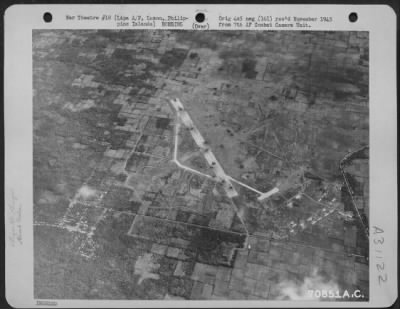 Thumbnail for Consolidated > Bomb craters on the runway at Lipa Airfield, Luzon in the Philippine Islands, make it impossible for the Japanese to use the strip. 14 February 1945.