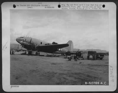 Consolidated > Mechanics Changing Engine On Curtiss C-46 Commando 'Quivering Sal' At Clark Field, Luzon, Philippine Islands - 25 June 1945.