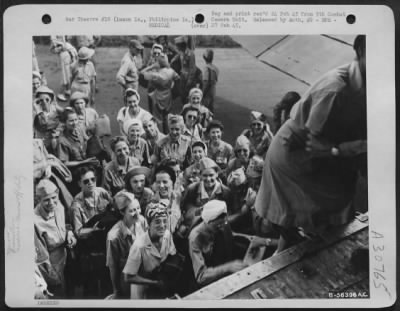 Thumbnail for Consolidated > Manila, Philippine Islands - Loading The Nurses. They Carried Only The Minimum Of Hand Baggage. Only A Few Mementoes And Personal Items Of Their Long Imprisonment. They Were Almost Devoid Of Personal Apparel. The Army, However, Re-Outfitted Them In Travel