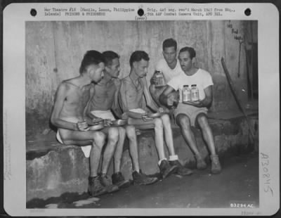 Thumbnail for Consolidated > Whereas A Normal Diet For One Man Averages 3500 Calories A Day, The Japanese Allowed Only 600 Or Less A Day To Veterans Of Corregidor And Bataan Held Prisoner At Bilibid Prison, Manila, Philippine Islands.  Shown Here Enjoying A Square Meal After Their Li