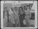 Thumbnail for Anna Lee, motion picture star, and Winnie Shaw, popular American blues singer, greeting members of a Ninth U.S. Air Force Consolidated B-24 "Liberator" crew upon the latter's return to their base near Bengasi, Cirenaica, Libya, from a raid over enemy - Page 1