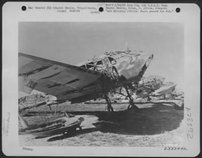 Thumbnail for Consolidated > A line of burned out enemy airplanes on the airfield at Castel Benito, near Tripoli, Tripolitania, Libya. 26 January 1943.