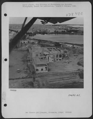 Thumbnail for Consolidated > Wrecked warehouses on the waterfront at Bengasi, Cirenaica, Libya. The port had been the target for heavy bombers of the Allied Air Forces for months. Thousands of tons of war material were destroyed on the quays.