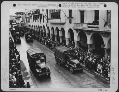 Thumbnail for Consolidated > American "6 bty "6 trucks with machine gun turrets in roofs of drivers' cabs move by during parade of French and American troops in Northern Africa.