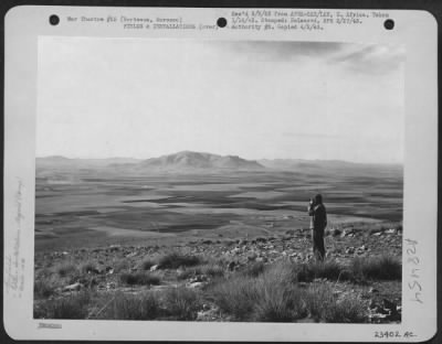 Consolidated > Berteaux, Morocco-North African mountain outlook of the 14th Fighter Group. The airdrome is situated in the countryside beneath.