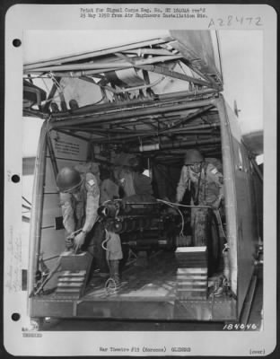 Consolidated > Members of the 82nd Airborne Division with their 75 mm Howitzer tided down inside a glider, taken during invasion training under direction of 5th Army, commanded by Lt. Gen. Mark W. Clark, Oujda, Morocco, North Africa, 11 June 1943.