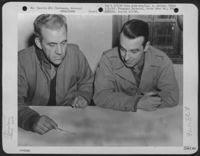 Thumbnail for Consolidated > Berteaux, Morocco-Air Corps Intelligence Officers of the 310th Bomb Group in Morocco are preparing a raid on Axis held territory. (L to R) Capt. Gordon Locke, Phila., Penn. And his assistant, 1st Lt. T.P. O'Brian, Wheeling W. Va.