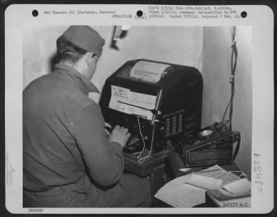 Thumbnail for Consolidated > Bertreaux, Morocco-Aviation Signal Teletype Operator, Pvt. Rudolph Houston, Durant, Okla., sending a message to a fighter group from a U.S. Bomber Headquarters somewhere in Morocco.