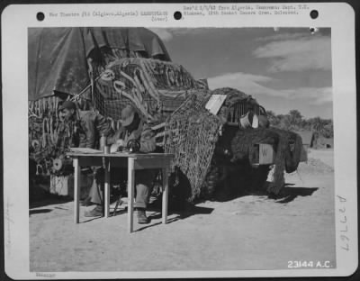 Consolidated > Algiers, Algeria-Camouflaged truck.