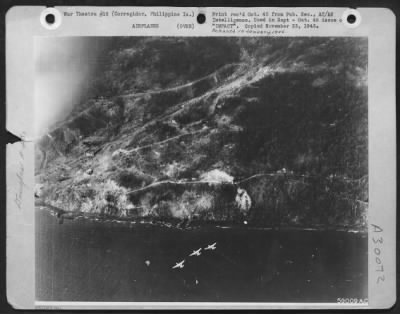 Thumbnail for Consolidated > Douglas A-20's head for targets on Corregidor while the invasion is under way. These planes later worked "on call" from ground troops.