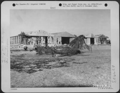 Thumbnail for Consolidated > Buildings U.S. plane which were damaged during German night raid on an airport at Maison Blanche, Algeria. 21 November 1942.