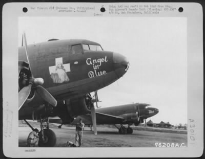 Thumbnail for Consolidated > Douglas C-47's "Angel in Blue" and "The Sioux" on flight line at Palawan Island, Philippines, 16 June 1945.