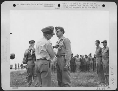 Thumbnail for Consolidated > 1st Lt. Harry H. Stanford, Munising, Mich., receiving the Distinguished Flying Cross from Maj. Gen. Lewis H. Brereton. NORTH AFRICA.