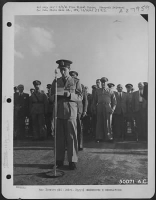 Consolidated > Cairo, Egypt-King Peter of Yugoslavia delivers the note of acceptance of four Liberator Bombers from the United States, manned by American trained native patriot crews. Major General Ralph Royce, background right, presented these planes to the King.