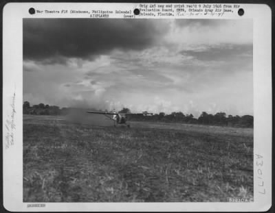 Thumbnail for Consolidated > Artillery Liaison plane taking off from Kibawe Airstrip, Mindanao, Philippine Islands. Due to the length of grass, softness of fields and shortness of the airstrips, this field was usable only by Liaison planes. 5 May 1945.