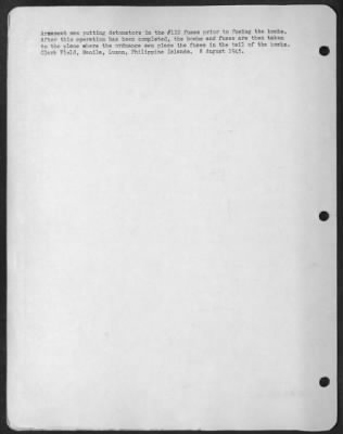 Thumbnail for Consolidated > Armament men putting detonators in the #112 fuses prior to fusing the bombs. After this operation has been completed, the bombs and fuses are then taken to the plane where the ordnance men place the fuses in the tail of the bombs. Clark Field, Manila