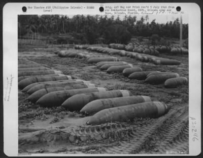 Thumbnail for Consolidated > Armor piercing bombs at bomb dump on Lingayen Airstrip, Philippine Islands. 12 June 1945.