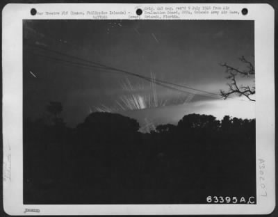 Thumbnail for Consolidated > Anti-aircraft artillery firing upon Japanese planes during 23 March raid when they came over to bomb an ammunition dump at Rabon. 1945. Luzon, Philippine Islands.