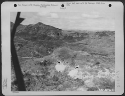 Thumbnail for Consolidated > The Japanese were firmly entrenched in caves in the hillsides surrounding Clark Field on Luzon, Philippine Islands. They had an ample supply of guns and ammunition. In order to clear out the area, foot soldiers had to climb up the steep slopes in the