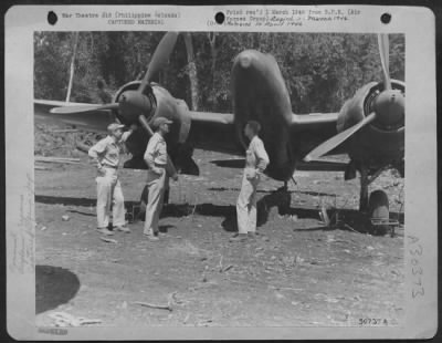 Consolidated > This twin-engine Japanese fighter plane of the "Nick" class was found wrecked on Palawan when the U.S. troops invaded the island. Technicians of the 13th AAF service squadron made it fit to fly by salvaging parts from other aircraft damaged by the