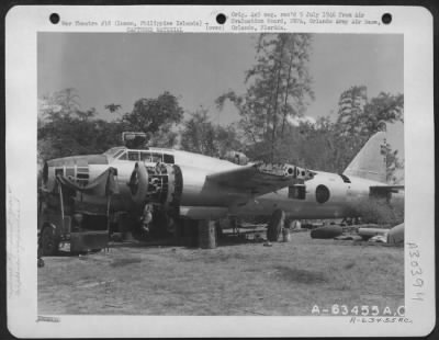Consolidated > Japanese "Betty" captured by our forces, shown at Clark Field as it was being put into flying condition by Technical Air Intelligence Unit, SWPA. 1945.