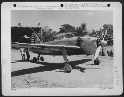 Consolidated > Japanese "George"captured by our forces, shown at Clark Field being put into flying condition by Technical Air Intelligence Unit, SWPA. 1945. Luzon, Philippine Islands.
