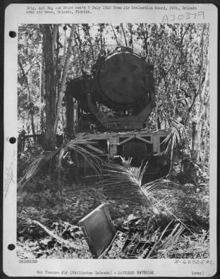 Thumbnail for Consolidated > This Japanese searchlight mounted on a truck was found in the mountains, 5 miles north of Padada Airstrip, Mindanao, in the Philippine Islands. 3 May 1945.