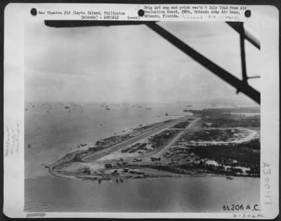 Thumbnail for Consolidated > An Aerial View Of Tacloban Airstrip, Leyte, Philippine Islands. In The Background Can Be Seen A Large Concentration Of Shipping. 28 November 1944.