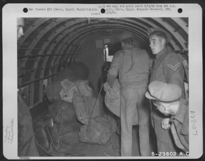 Thumbnail for Consolidated > Cairo, Egypt-Mail bags being loaded aboard U.S. Army Transport in the Middle East to be flown to the fighting men in the desert.