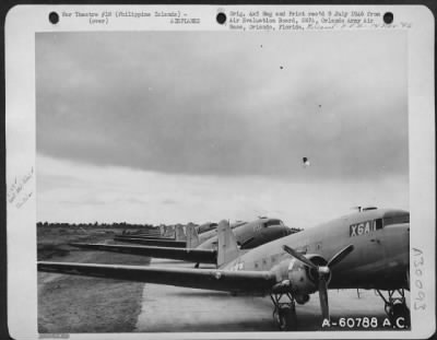 Thumbnail for Consolidated > Fifty Four C-47 "Skytrains" Of The 317Th Troop Carrier Command Parked In Take-Off Positions At Lipa Airstrip, Philippine Islands.  This Picture Was Made Just Prior To Dropping The 11Th Airborne Infantry Division Over Camalaniugan.  22 June 1945.