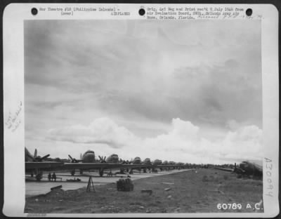 Thumbnail for Consolidated > Fifty Four C-47 "Skytrains" Of The 317Th Troop Carrier Command Parked In Take-Off Positions At Lipa Airstrip, Philippine Islands.  This Picture Was Made Just Prior To Dropping The 11Th Airborne Infantry Division Over Camalaniugan.  22 June 1945.