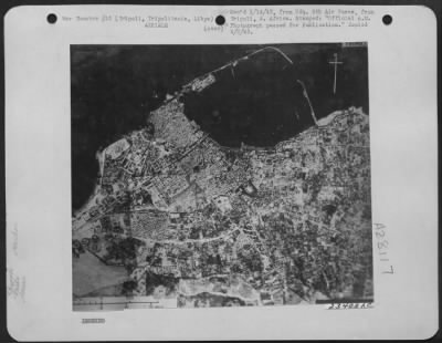 Thumbnail for Consolidated > Aerial view of the town and harbor of Tripoli, Tripolitania, Libya taken from a Royal Air Force aircraft during a recnet reconnaissance, 22 January 1943.