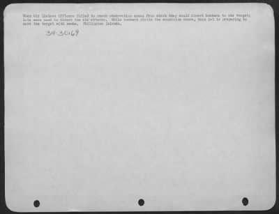 Consolidated > When Air Liaison Officers Failed To Reach Observation Areas From Which They Could Direct Bombers To Targets; L-5S Were Used To Direct The Air Attacks.  While Bombers Circle The Mountians Above, This L-5 Is Preparing To Mark The Target With Smoke.  Philipp