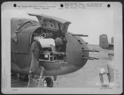 Thumbnail for Consolidated > Armament Men At Work On .50 Caliber Guns In A North American Mitchell B-25J.  This Plane Has A Total Of Eighteen .50 Caliber Machine Guns.  500Th Bomb Group At Clark Field, Luzon Island.  19 May 1945.