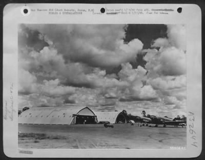 Thumbnail for Consolidated > Hangars & parked planes at Wards Field, Port Moresby, Papua, New Guinea.