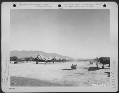 Thumbnail for Consolidated > Douglas C-47s lined up for the morning take-off on the parking strip near the tower on the North Strip at Myitkyina, Burma. 16 December 1944.