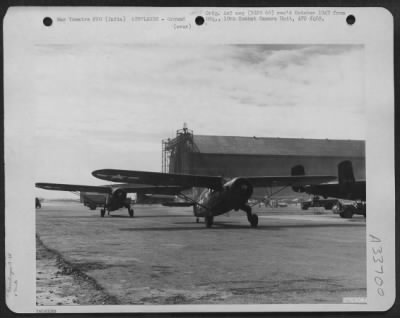 Thumbnail for Consolidated > At a field near Karachi, India, Noorduyn C-64's taxi out onto the strip to take off on a flight to the field at Lalaghat, India. 1st Air Commando Force.