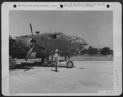 Thumbnail for Consolidated > Sikh tribesman guarding a North American B-25 of the 341st Bomb Group in revetment illustrates phase of reverse lend-lease. India.