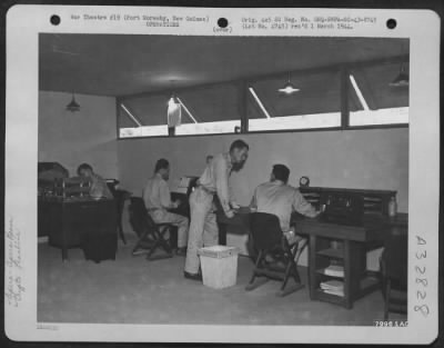 Consolidated > Interior view of the cryptographic room, Radio and Aircraft Warning Section, at Port Moresby, New Guinea. 12 August 1943.