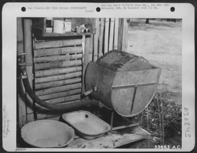 Thumbnail for Consolidated > NEW GUINEA-Close-up of home made print washer in action.